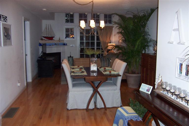 16 Gold Leaf Lane, Unit 16 Mashpee, MA 02649 - Photo 14 of 29 a view of a dining room with furniture and wooden floor