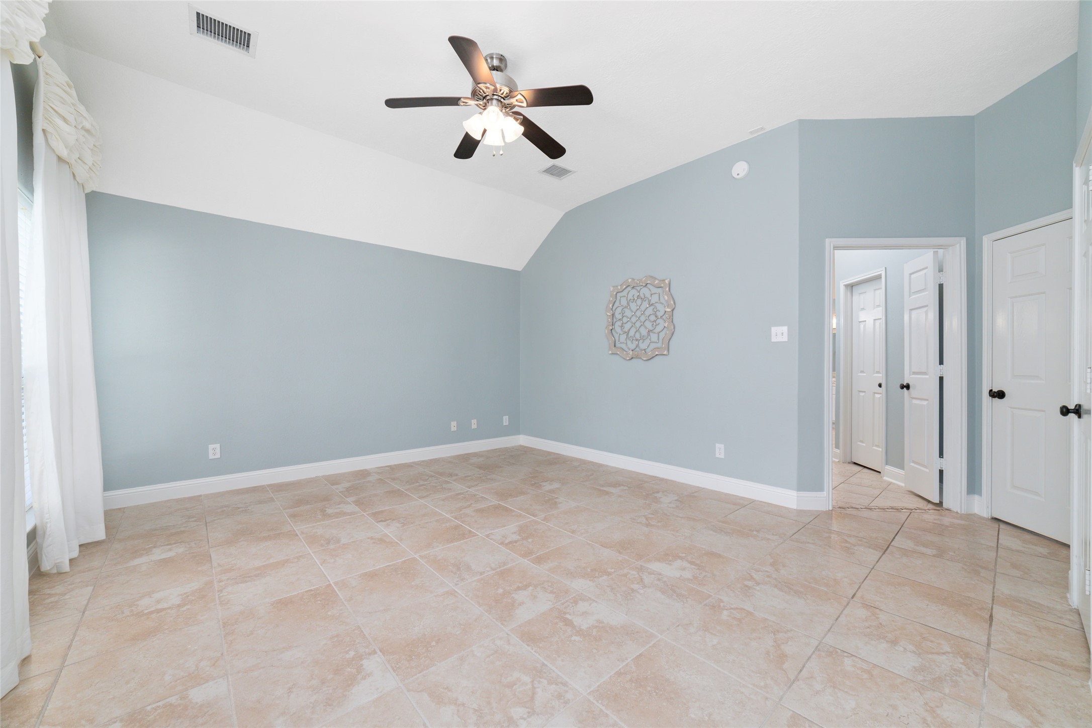 24203 Moon Ridge Court Katy, TX 77494 - Photo 25 of 43 View looking in the primary bedroom looking towards the bathroom.
