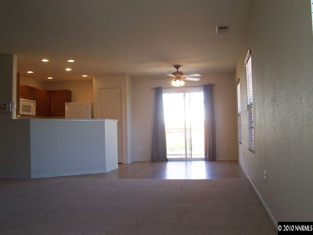 7651 Corso Street Reno, NV 89506 - Photo 3 of 6 a view of a livingroom with a chandelier