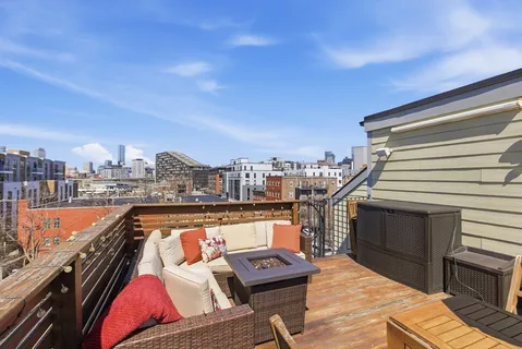 a view of a city with tall buildings