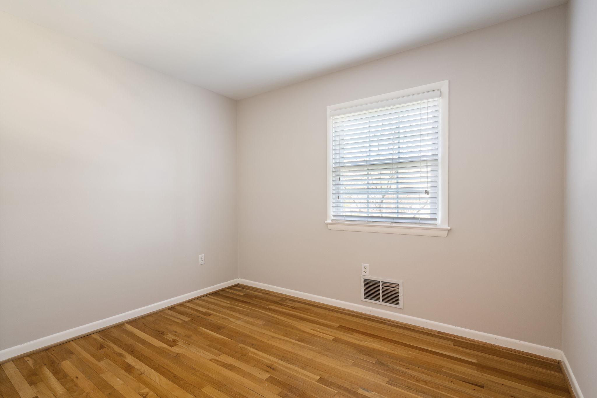7600 Kingsbury Road Alexandria, VA 22315 - Photo 16 of 31 a view of a room with wooden floor and natural light