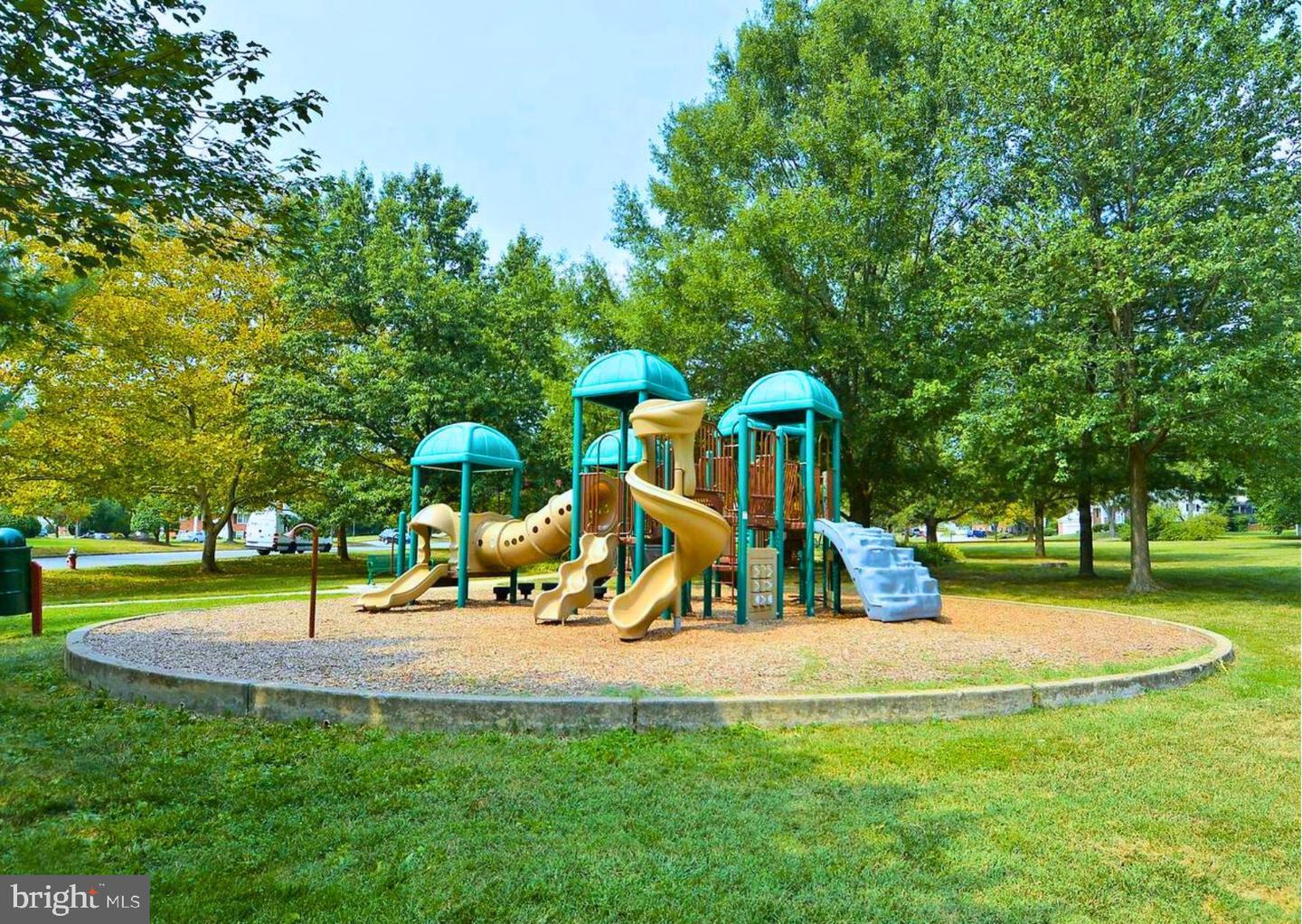 7600 Kingsbury Road Alexandria, VA 22315 - Photo 29 of 31 a view of park with swings and a slide