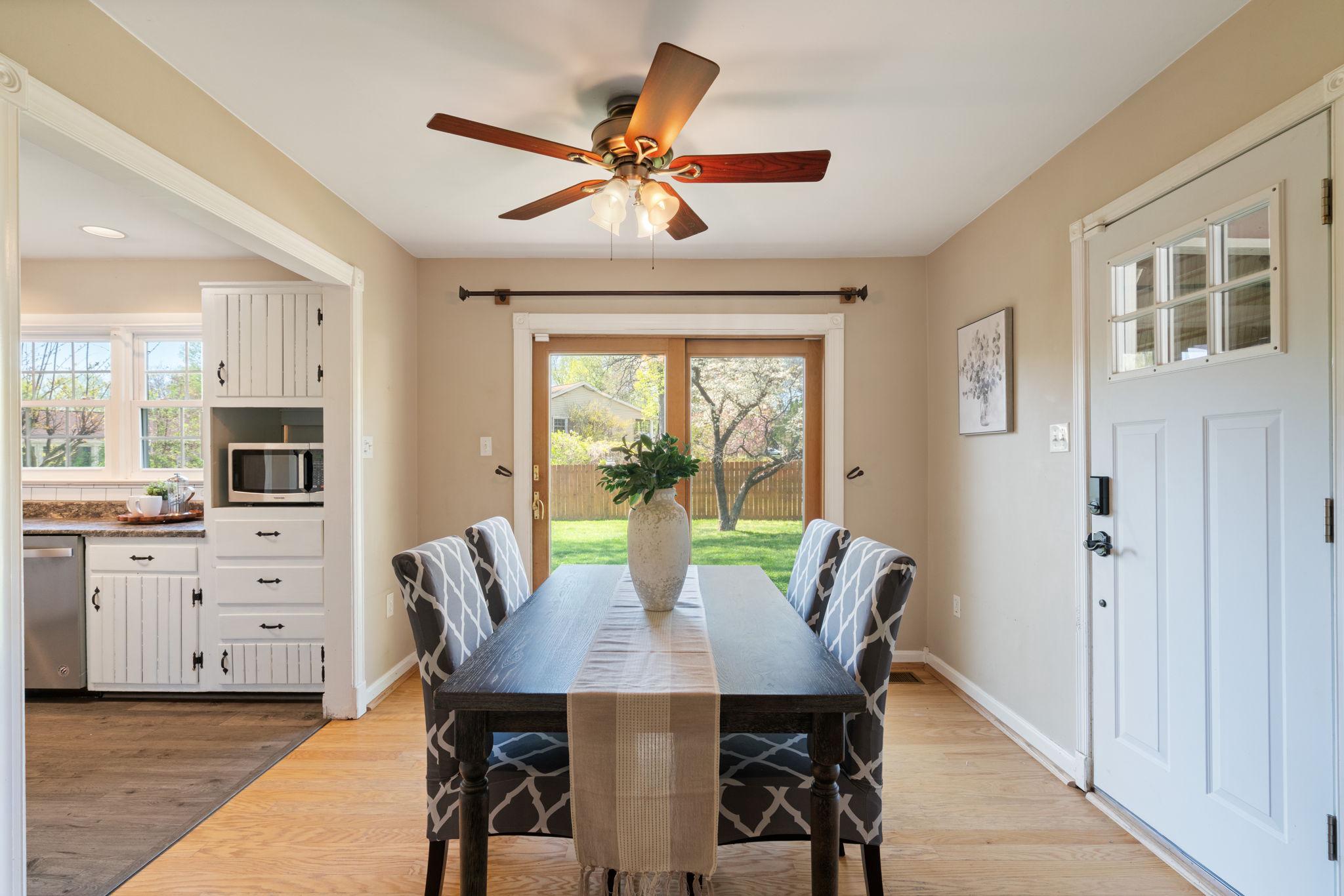 7600 Kingsbury Road Alexandria, VA 22315 - Photo 8 of 31 a view of a dining room with furniture window and outside view