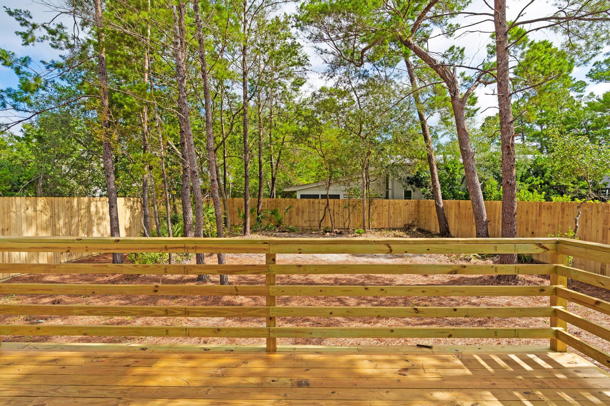 45 Laurel Oak Lane Santa Rosa Beach, FL 32459 - Photo 14 of 30 a view of a swimming pool with an outdoor space and seating area