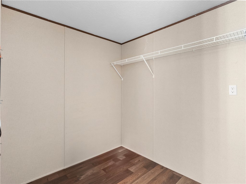 401 Mormon Church Road Seneca, SC 29678 - Photo 32 of 43 This closet offers ample storage space with sleek wire shelving and durable flooring.