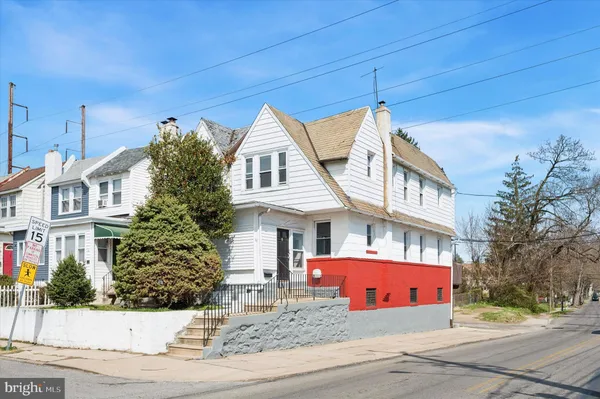 a front view of a house with garage