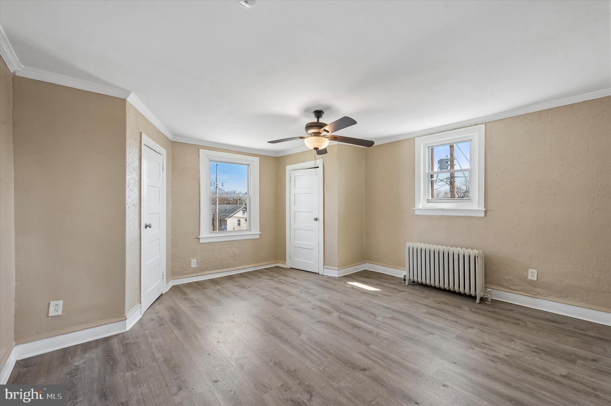 59 Houston Road Lansdowne, PA 19050 - Photo 16 of 24 a view of an empty room with wooden floor and a window