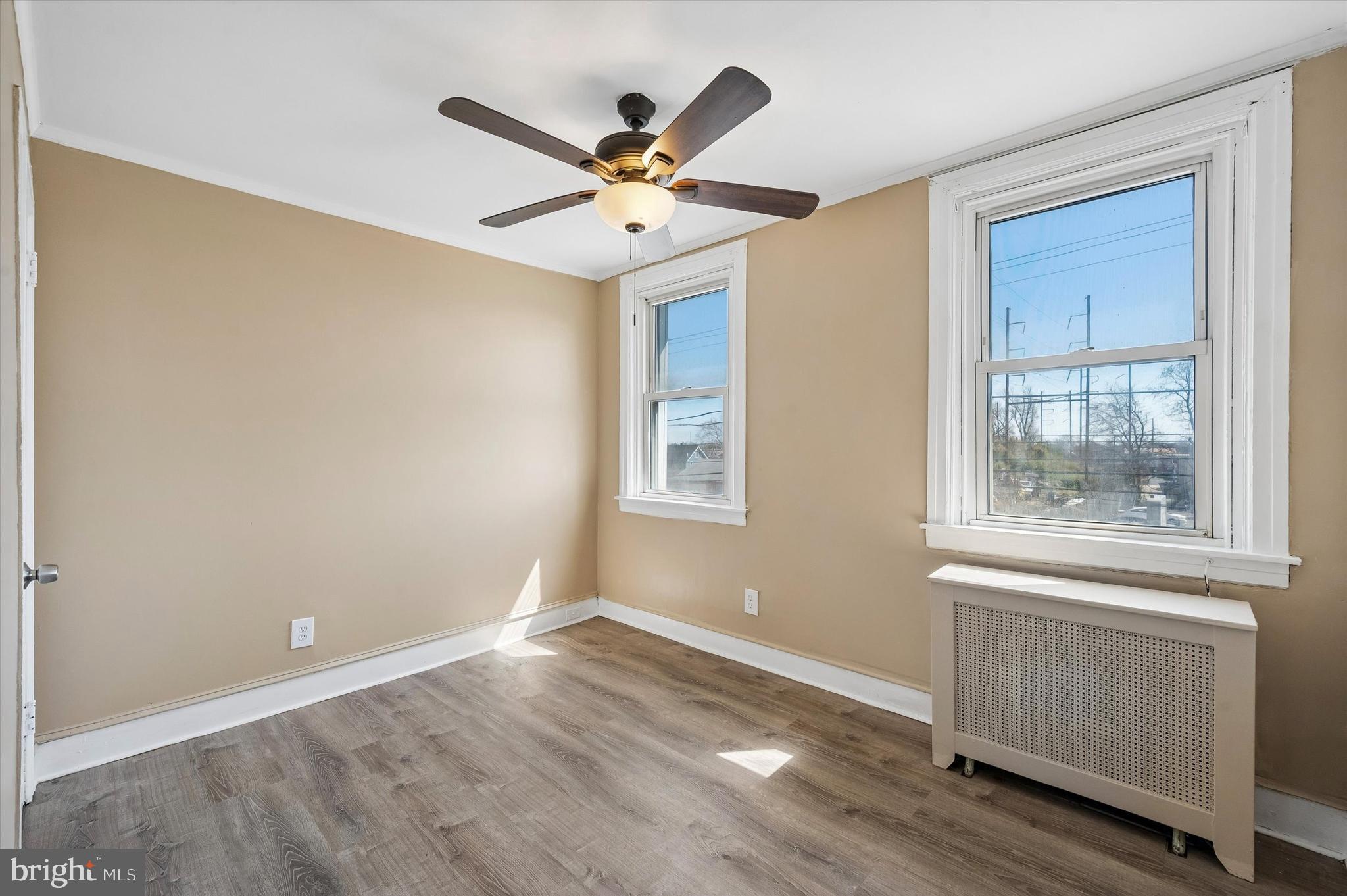 59 Houston Road Lansdowne, PA 19050 - Photo 18 of 24 a view of an empty room with wooden floor and a window