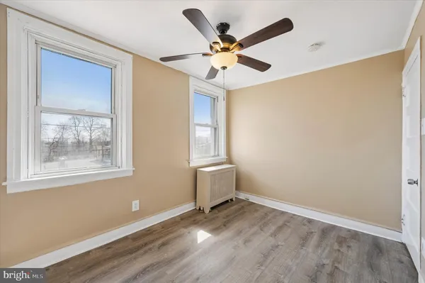a bathroom with a bathtub and a sink