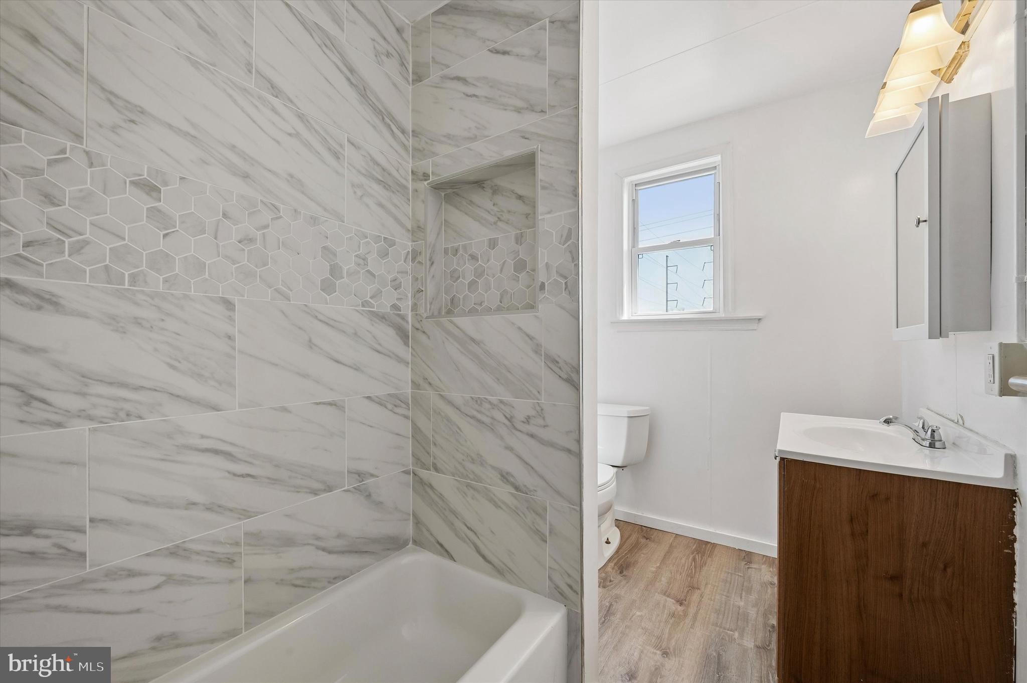 59 Houston Road Lansdowne, PA 19050 - Photo 20 of 24 a bathroom with a bathtub and a sink