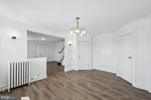 a kitchen with a sink cabinets and window