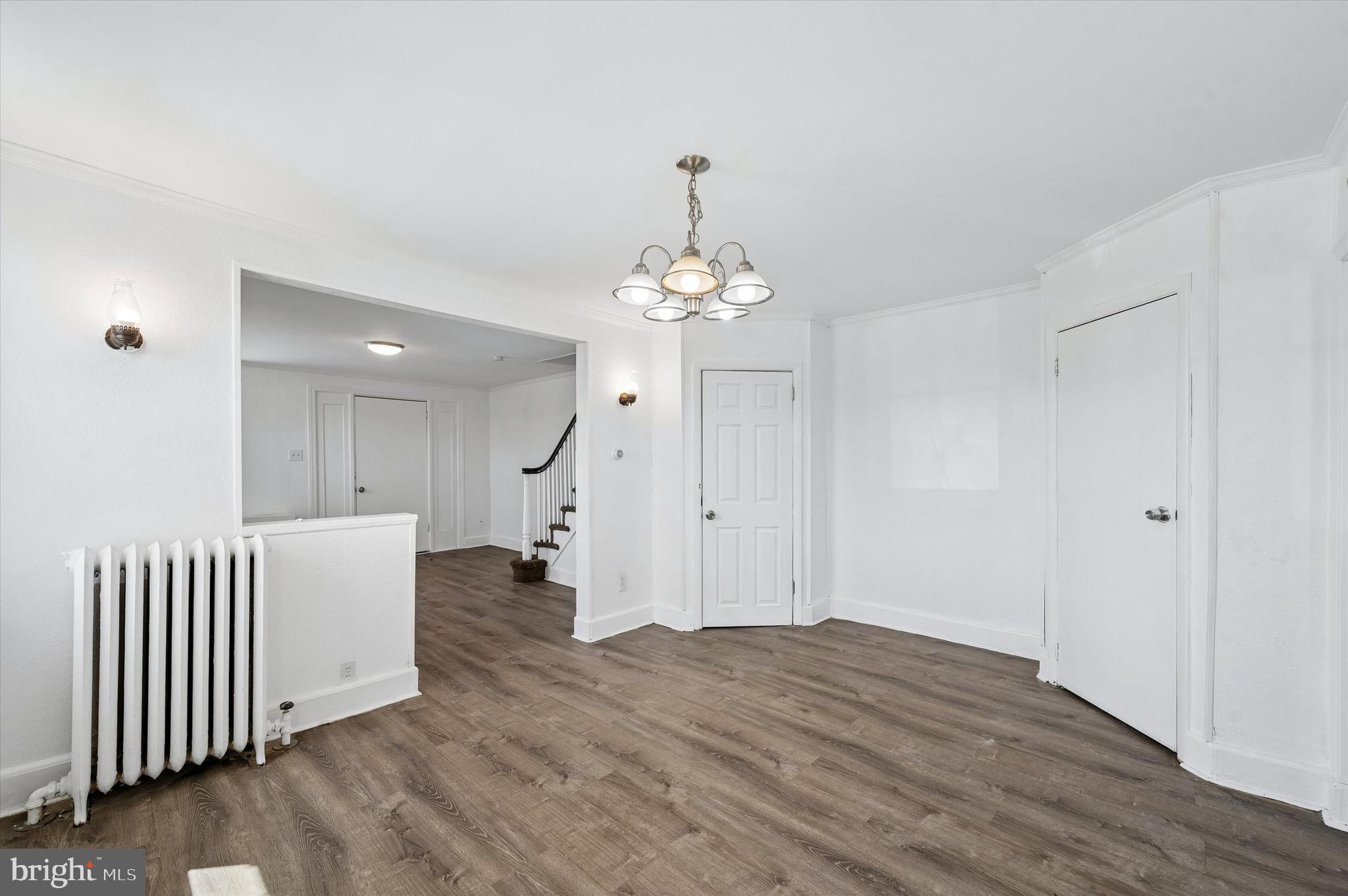 59 Houston Road Lansdowne, PA 19050 - Photo 9 of 24 wooden floor in an empty room with a window