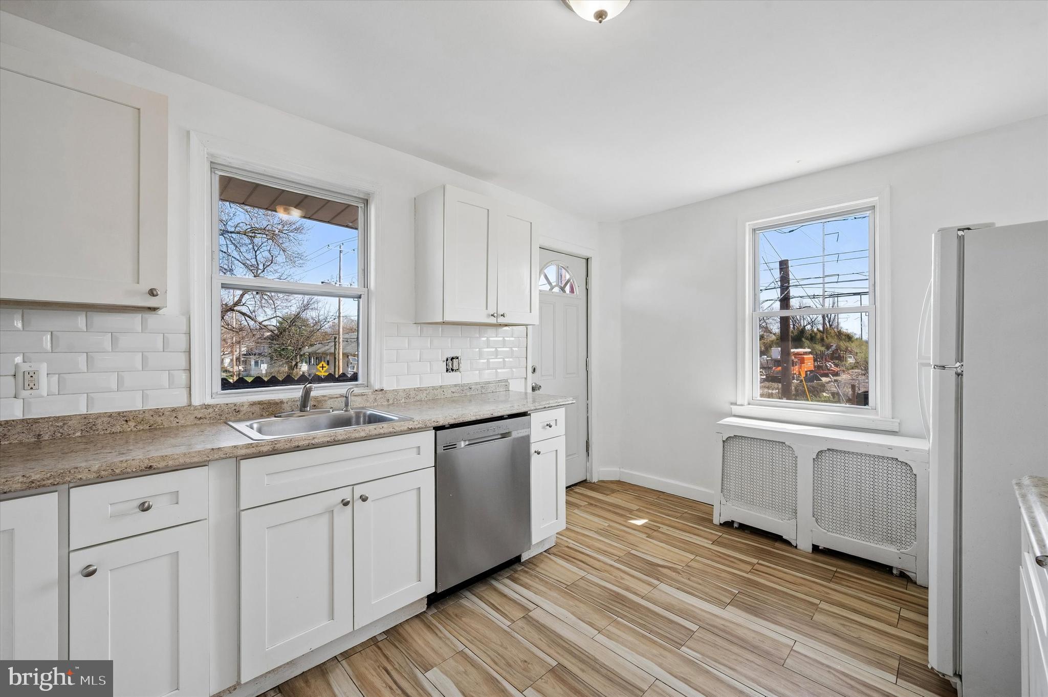 59 Houston Road Lansdowne, PA 19050 - Photo 10 of 24 a kitchen with a sink cabinets and window