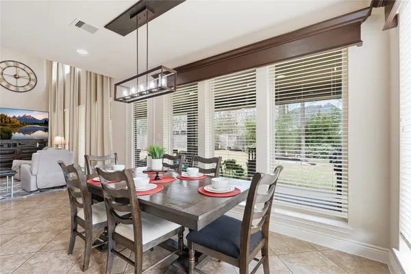 a kitchen with stainless steel appliances granite countertop sink stove and refrigerator