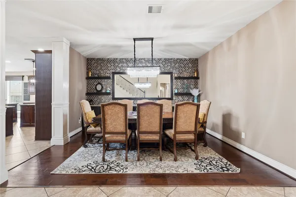 a living room with furniture a fireplace and a window