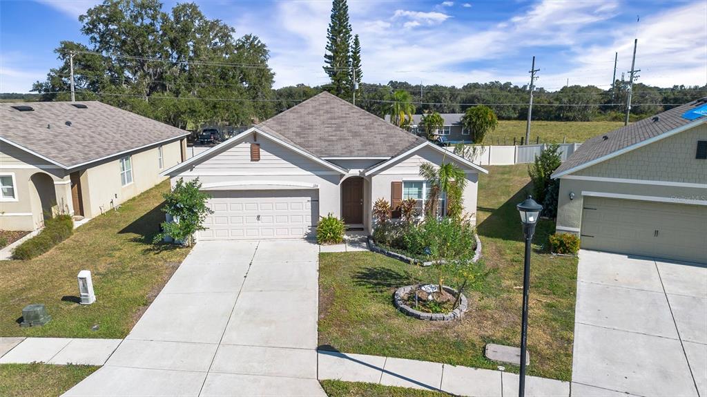 a view of a house with a garden