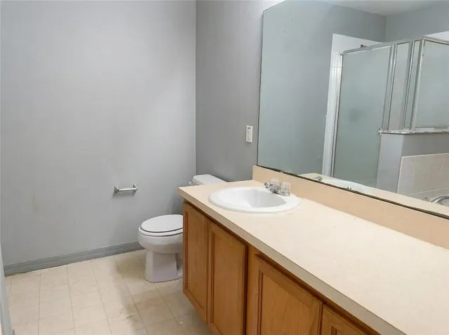 a bathroom with a sink and a toilet