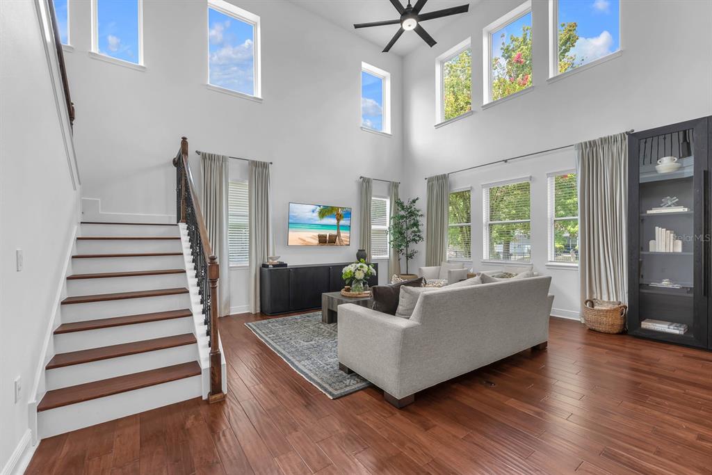 5310 Fishhawk Ridge Drive Lithia, FL 33547 - Photo 9 of 52 a living room with furniture and a wooden floor