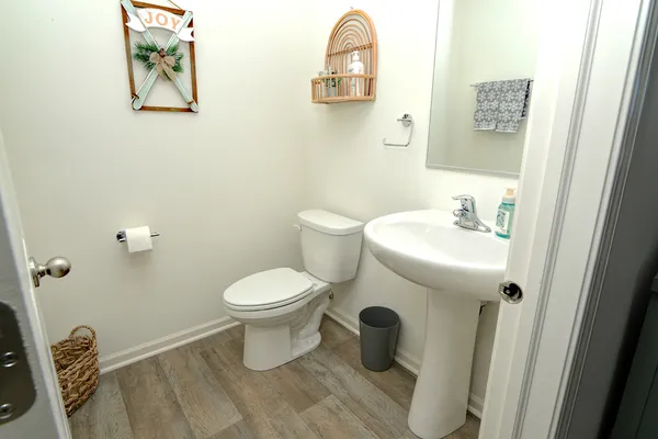 a bathroom with a toilet and a sink