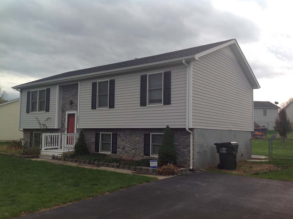 131 Buckboard Road Waynesboro, VA 22980 - Photo 1 of 17 a front view of a house with a garden