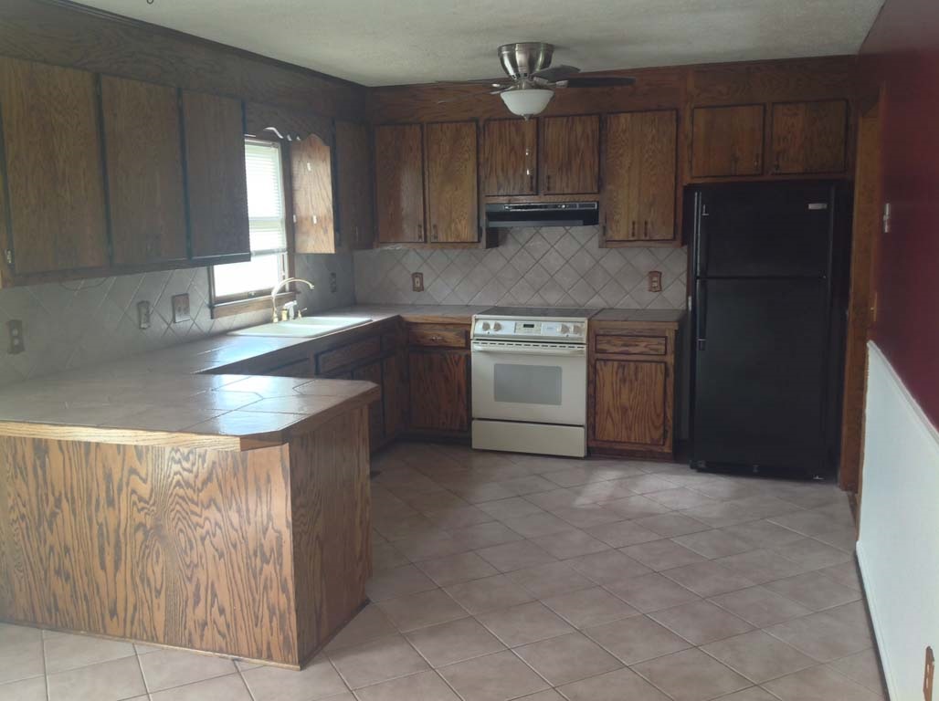 131 Buckboard Road Waynesboro, VA 22980 - Photo 11 of 17 a kitchen with stainless steel appliances granite countertop a sink counter space cabinets and a sink
