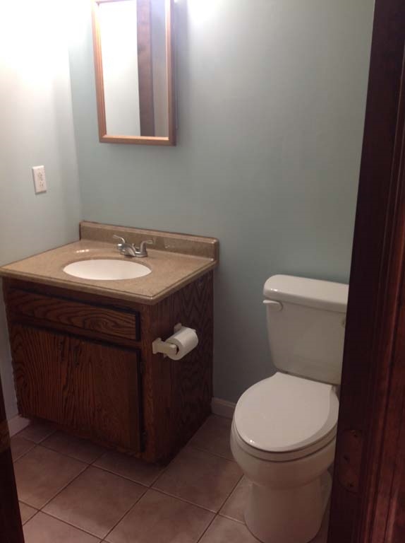 131 Buckboard Road Waynesboro, VA 22980 - Photo 13 of 17 a bathroom with a toilet sink and mirror