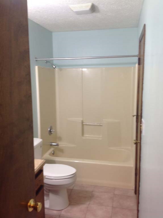 131 Buckboard Road Waynesboro, VA 22980 - Photo 14 of 17 a bathroom with a toilet a sink and shower
