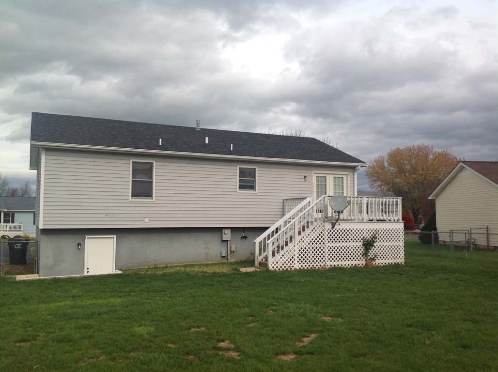 131 Buckboard Road Waynesboro, VA 22980 - Photo 2 of 17 a front view of a house with a garden