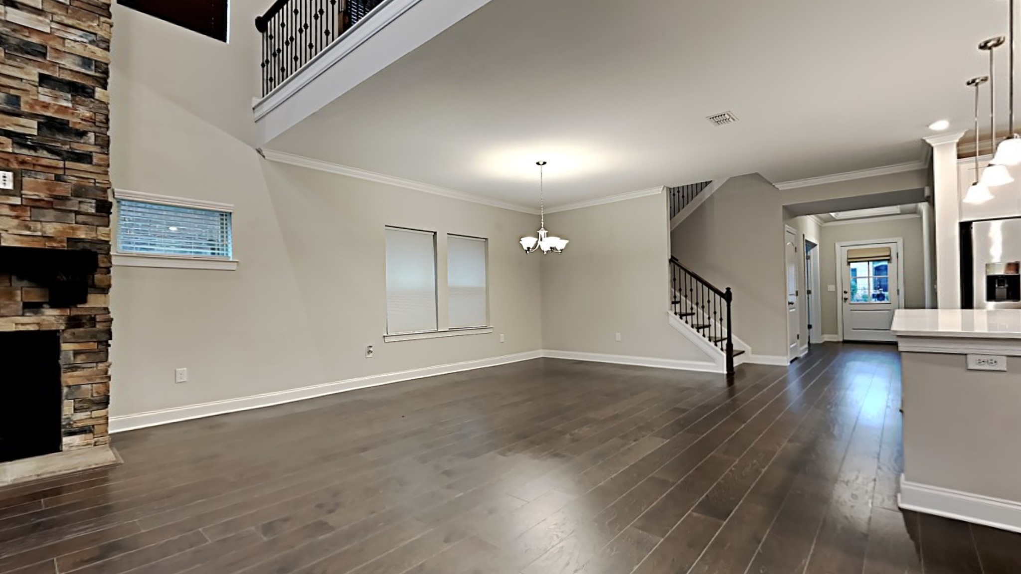 1007 Fenner Lane Gallatin, TN 37066 - Photo 5 of 18 an empty room with wooden floor and windows