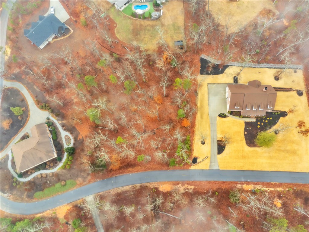 508 16th Circle Walhalla, SC 29691 - Photo 1 of 12 An aerial view showcases a residential property nestled amidst expansive natural surroundings with verdant trees.