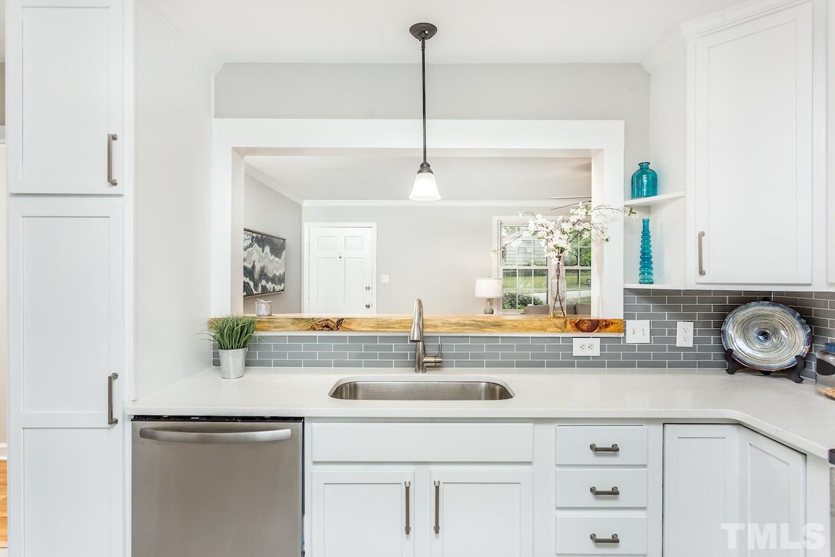 527 Banks Street Raleigh, NC 27604 - Photo 12 of 26 large openning to LR from kitchen.