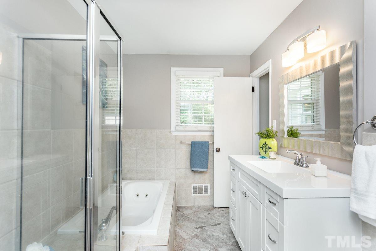 527 Banks Street Raleigh, NC 27604 - Photo 19 of 26 Large Hall Bath with separate walk in shower and Whirlpool tub