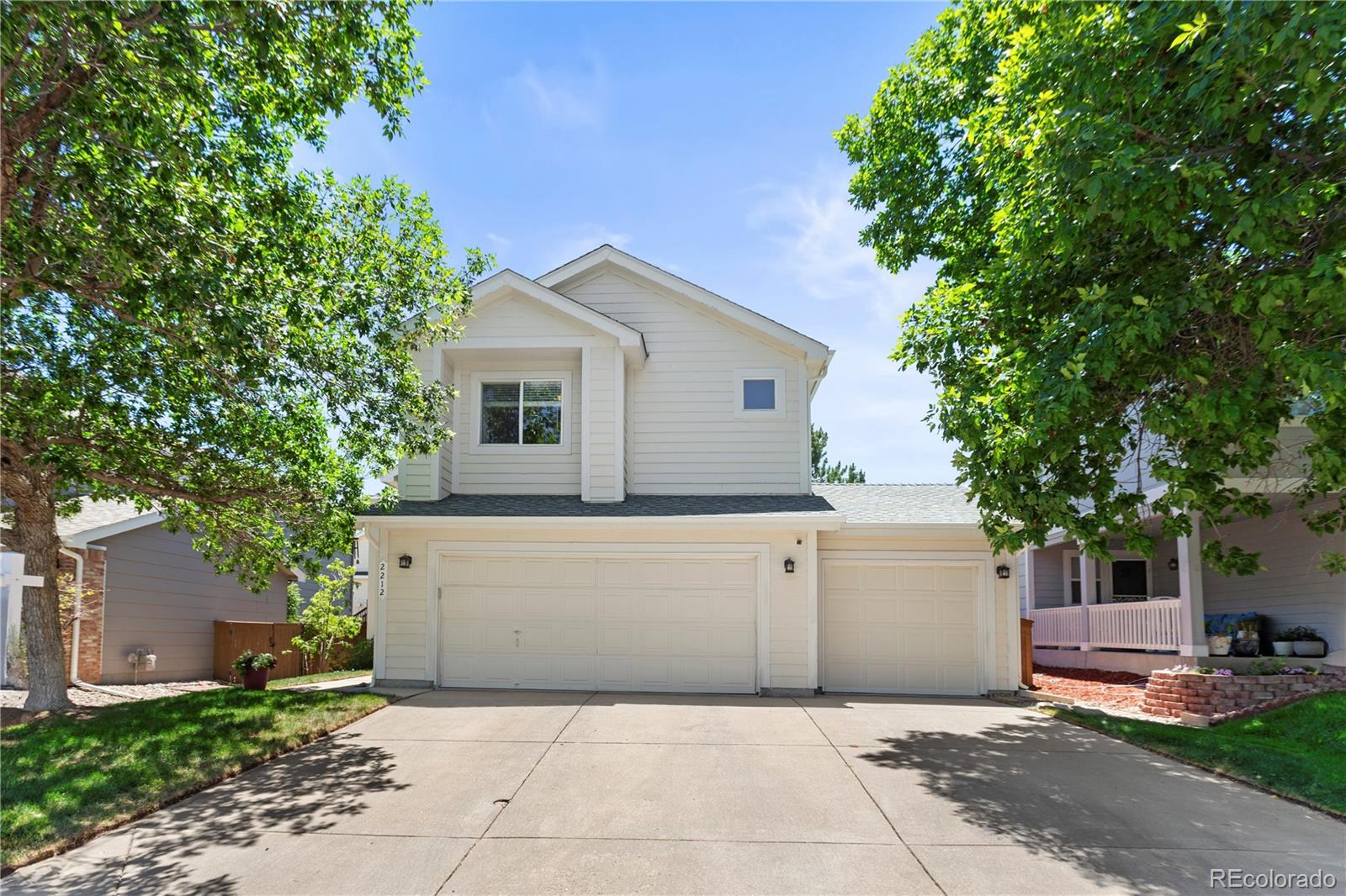 2212 Hyacinth Road Littleton, CO 80129 - Photo 3 of 44 a house view with a outdoor space