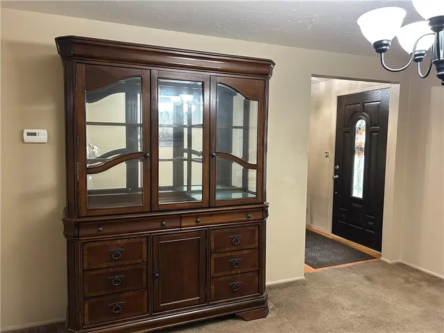 a view of dresser and window