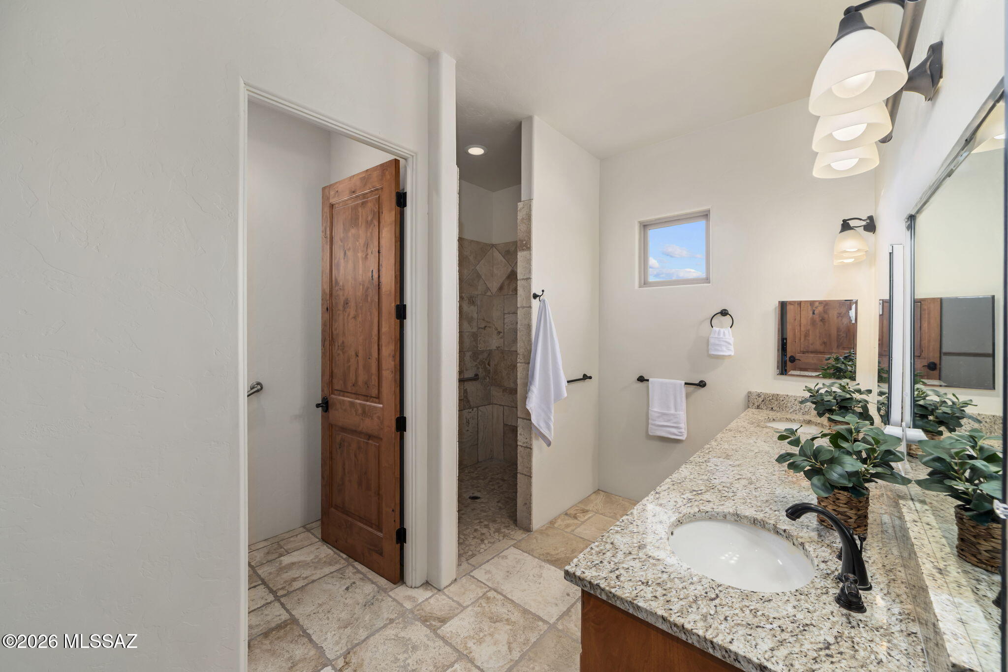45 High View Court Tubac, AZ 85646 - Photo 25 of 44 a bathroom with a granite countertop sink and a mirror