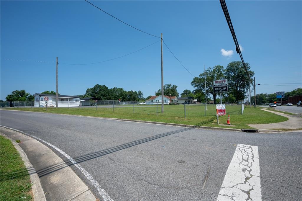 2213 Cleveland Highway Dalton, GA 30721 - Photo 22 of 41 a view of a garden with a small cabin