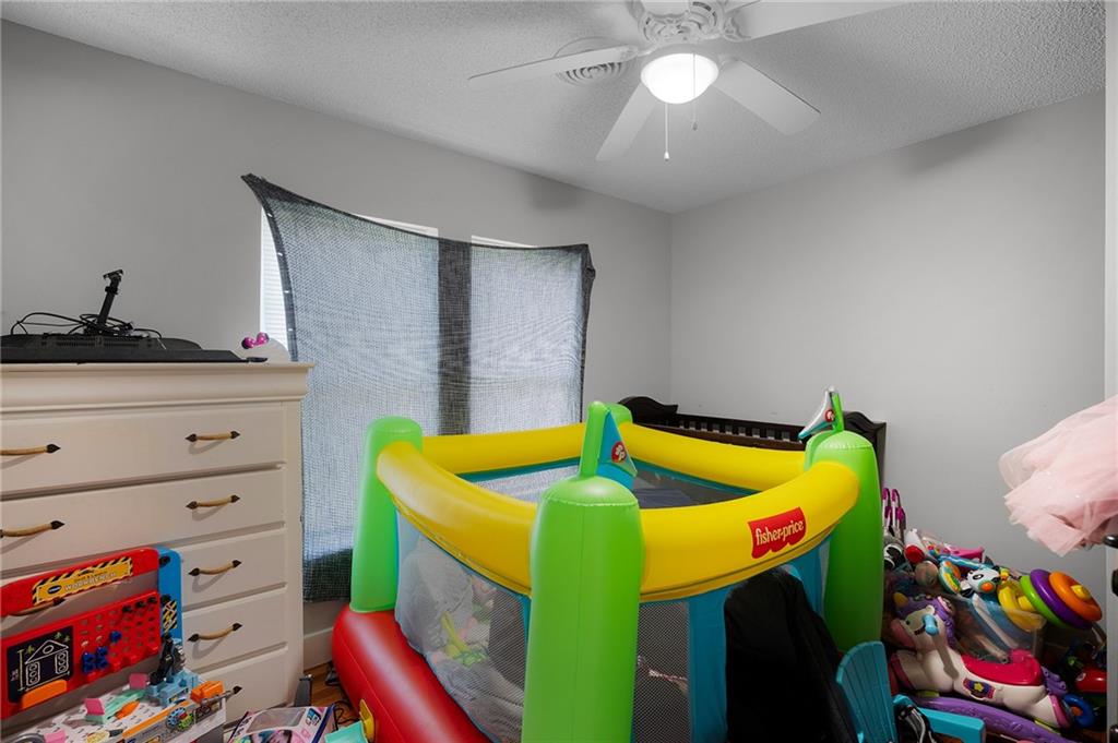 2213 Cleveland Highway Dalton, GA 30721 - Photo 26 of 41 a bathroom with a sink and a mirror
