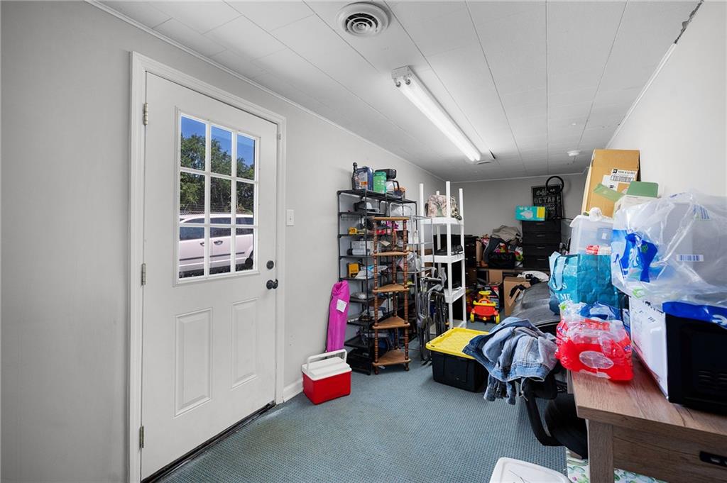 2213 Cleveland Highway Dalton, GA 30721 - Photo 31 of 41 a children room with toys and a fan