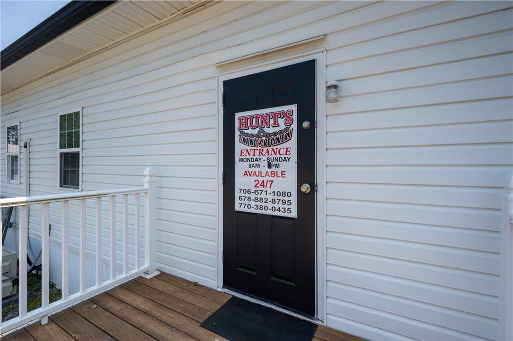 2213 Cleveland Highway Dalton, GA 30721 - Photo 41 of 41 a view of a door and wooden floor