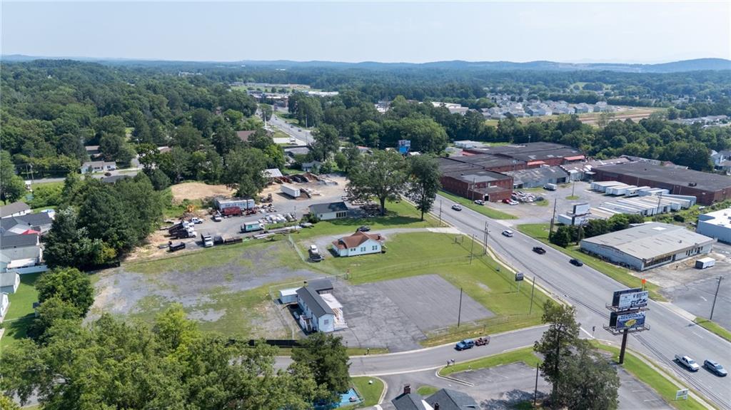 2213 Cleveland Highway Dalton, GA 30721 - Photo 5 of 41 an aerial view of a house with a garden