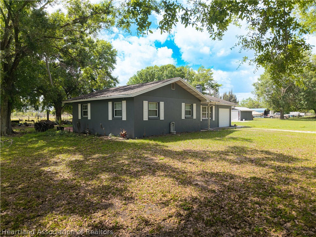 6041 Arbuckle Creek Road Sebring, FL 33870 - Photo 6 of 49