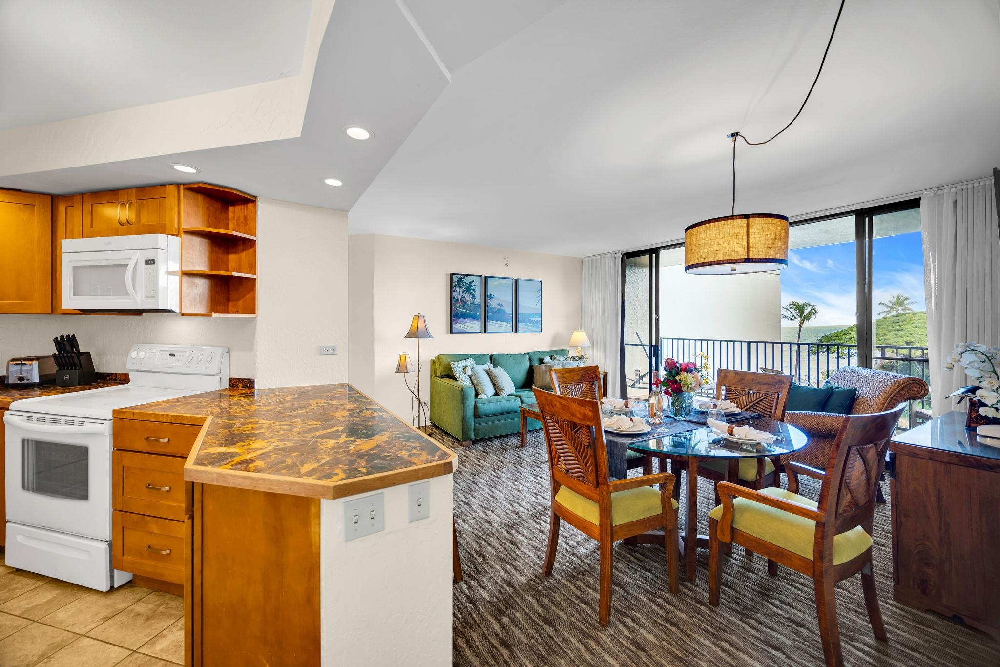 3445 Lower Honoapiilani Road, Unit 516 Lahaina, HI 96761 - Photo 16 of 49 a view of a dining room with furniture and window