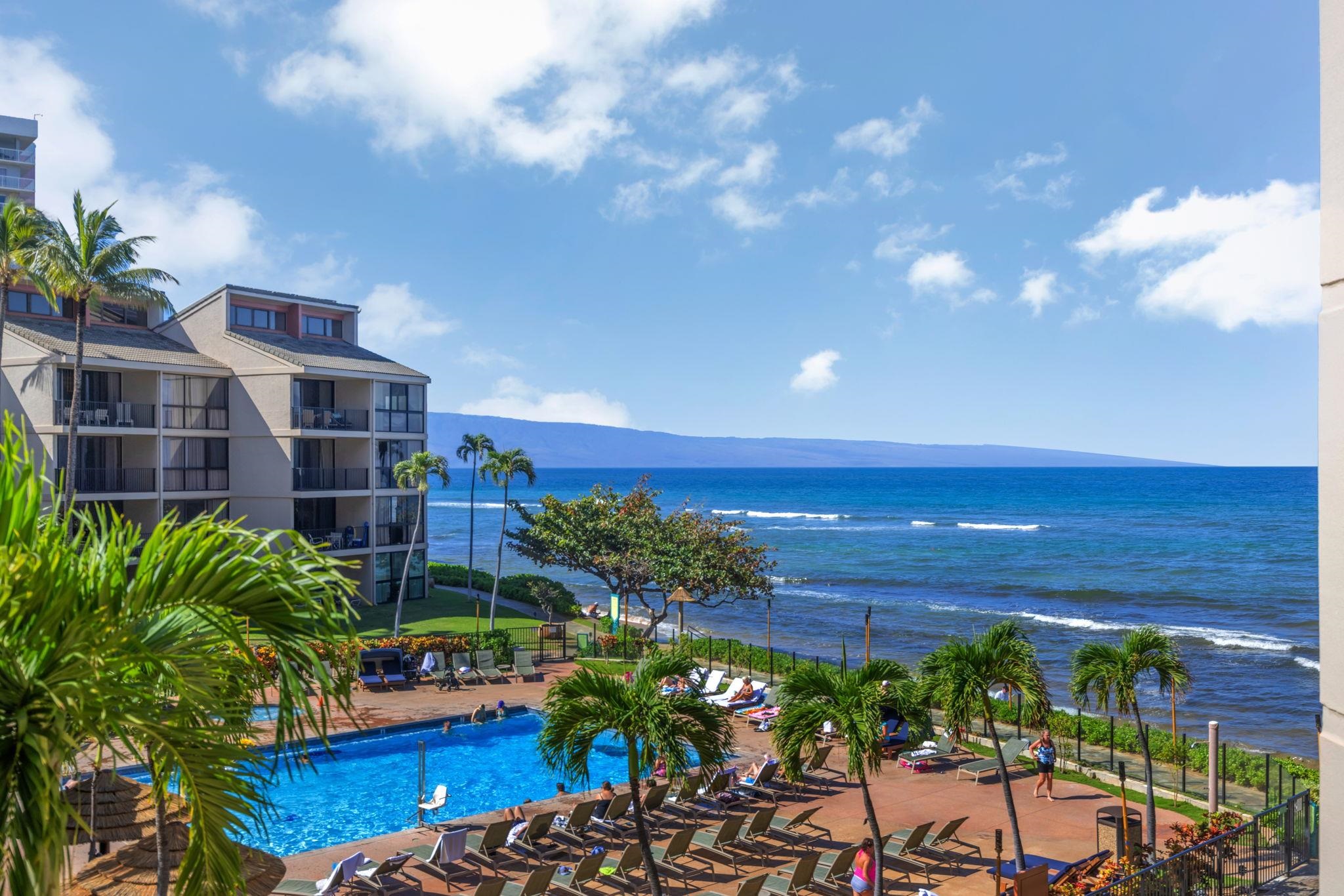 3445 Lower Honoapiilani Road, Unit 516 Lahaina, HI 96761 - Photo 3 of 49 a city view with tall buildings