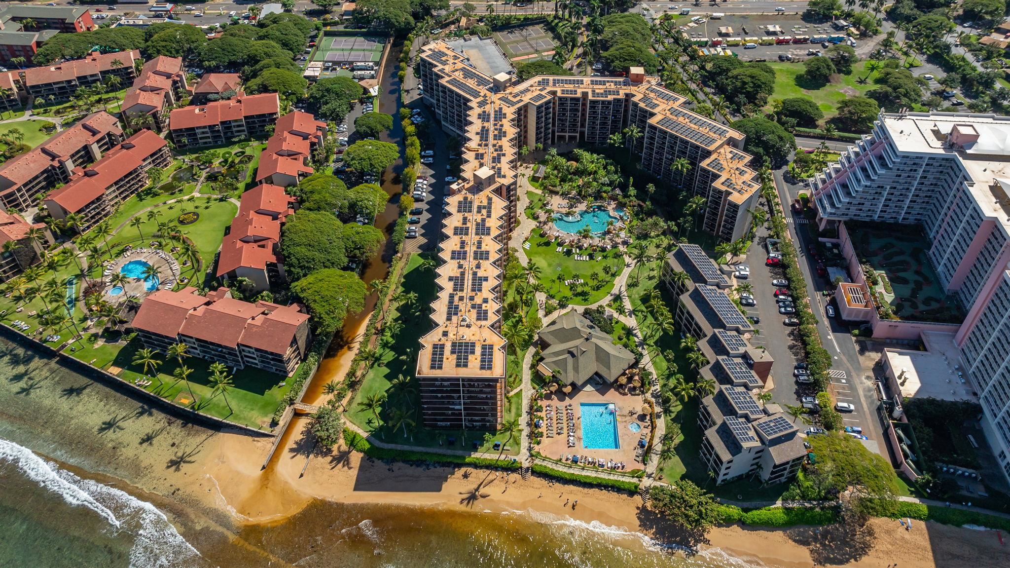 3445 Lower Honoapiilani Road, Unit 516 Lahaina, HI 96761 - Photo 38 of 49 an aerial view of multiple houses with yard