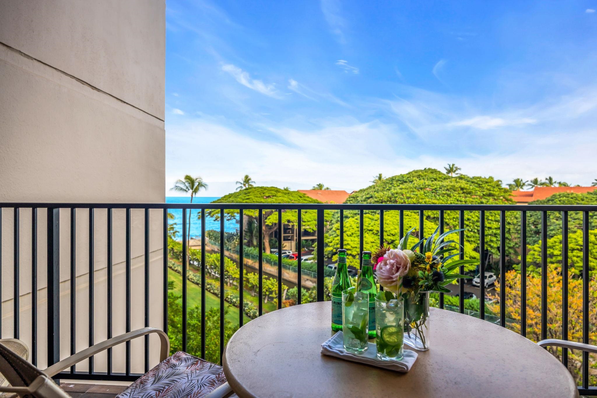 3445 Lower Honoapiilani Road, Unit 516 Lahaina, HI 96761 - Photo 48 of 49 a view of a houses and yard from a balcony
