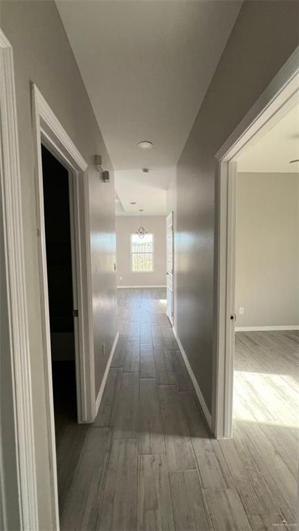 2108 Redbud Lane Weslaco, TX 78596 - Photo 3 of 9 a view of hallway with wooden floor