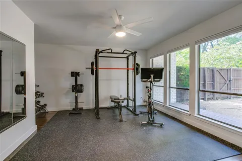 a view of a room with gym equipment