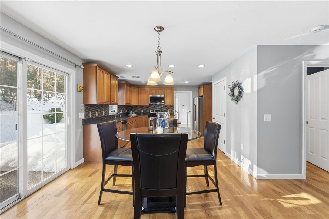 264 Round Top Road Burrillville, RI 02830 - Photo 14 of 49 sunny dining area between the kitchen and living space