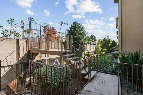 a view of a balcony with staircase