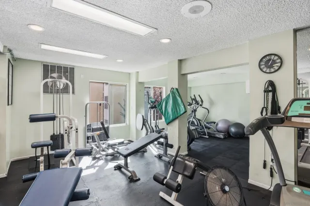 a view of a room with gym equipment
